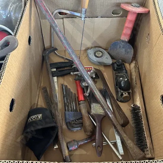 Box of tools including stanley plane
