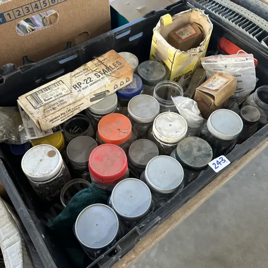 Bin of screws and staples including stainless steel.