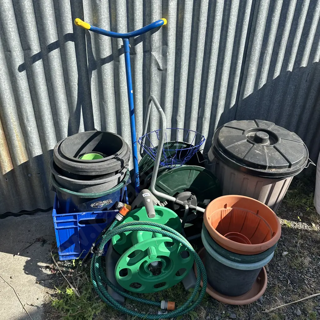 Hose and reels, plastic planters and soil breaker etc. Image 1++