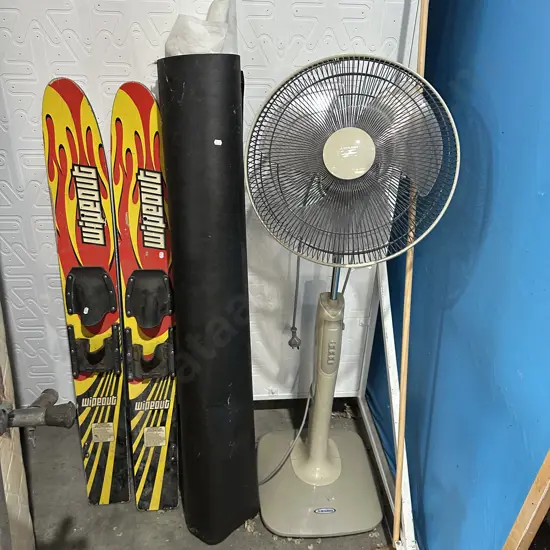 Skis, fan, building paper.