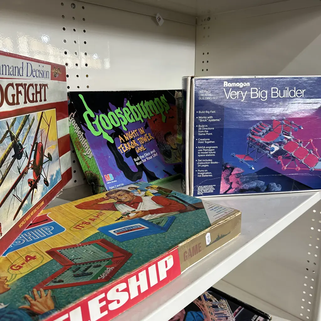 Shelf lot of games. Image 1++