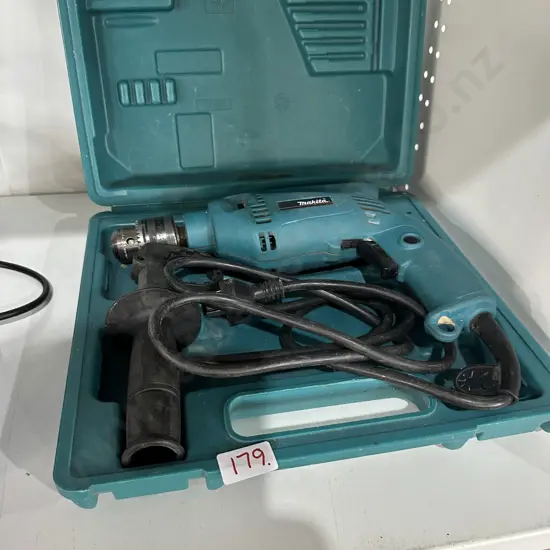 Makita hammer drill in case