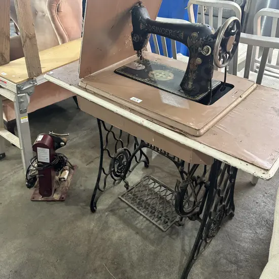 Treadle sewer