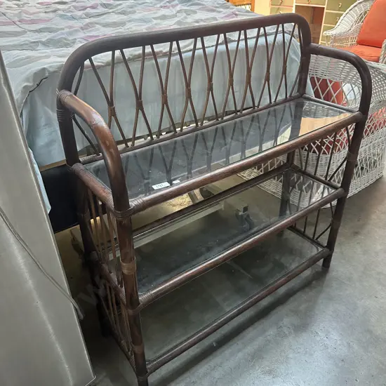 Cane and glass shelf unit