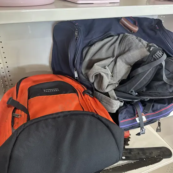 Shelf lot of bags