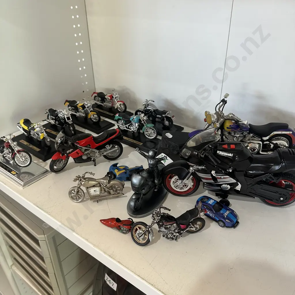 Shelf lot of model motorbikes Image 1++