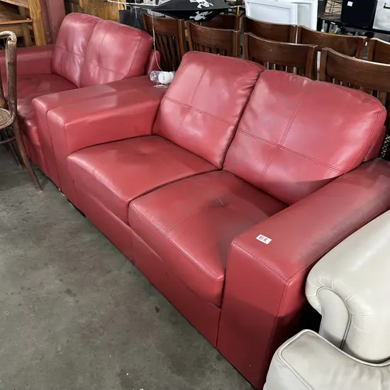 Pair red leather two seaters