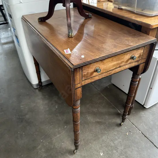 Drop leaf table with drawer