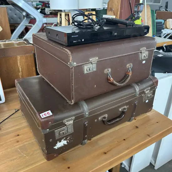 Two suitcases and Blu-ray disk player
