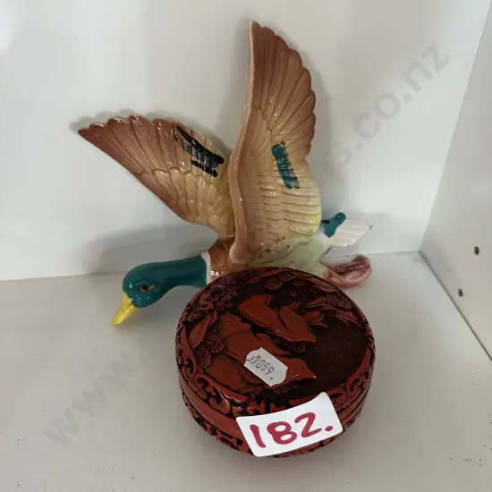 carved lidded jewellery dish and wall duck