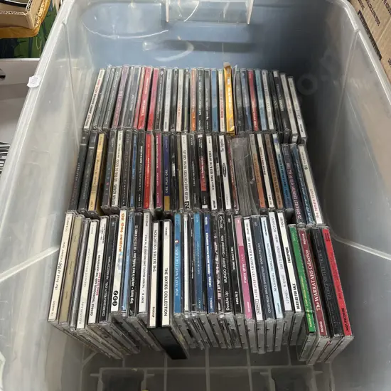 Lidded bin full of CDs
