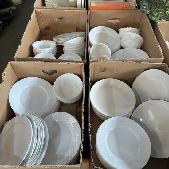 Four boxes plates and bowls.