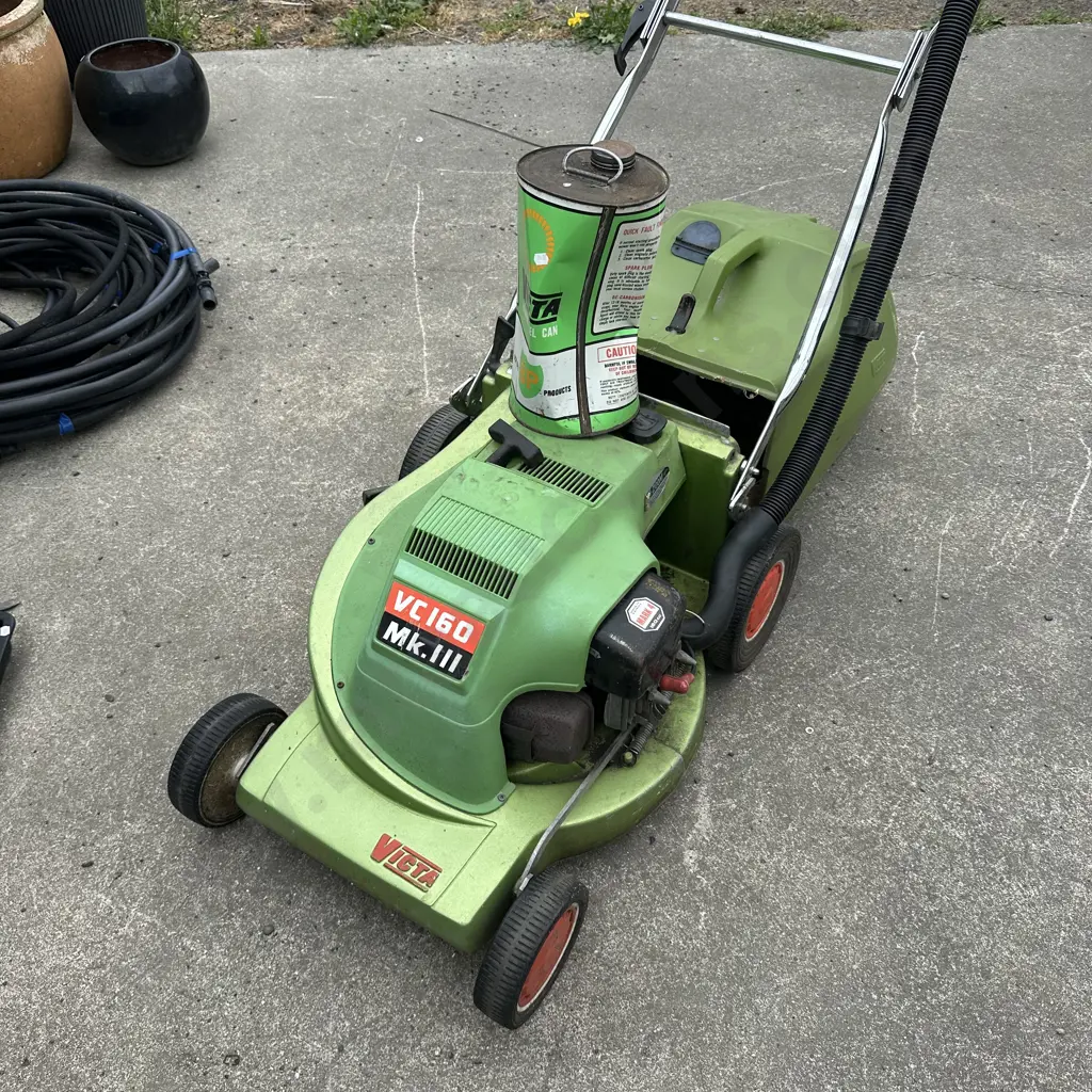 Vintage Victa mower and petrol can full. Image 1++