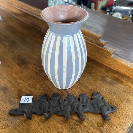 Retro pottery vase and cast coat rack