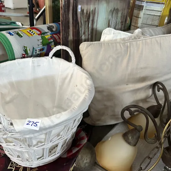 Cane basket, christmas car mats, cushions and pictures.