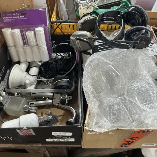 Two boxes glasses, bike tubes, door stops, headphones etc.