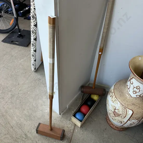 2 croquet mallets plus balls