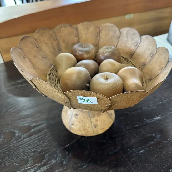 metal bowl and wooden fruit