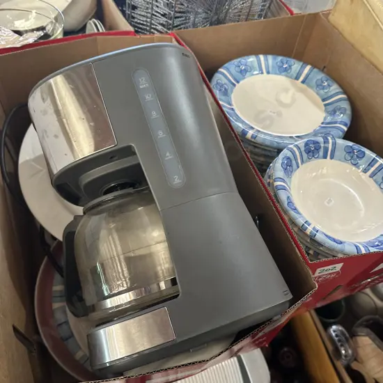 Two boxes of plates and coffee percolator
