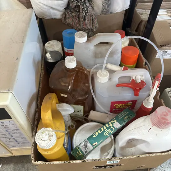 Box of cleaning products and spray paints etc.