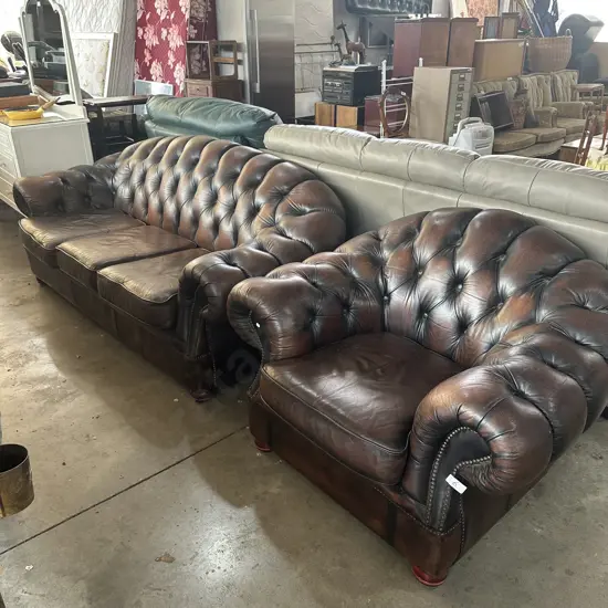 the matching buttonback rolled arm sofa and chair