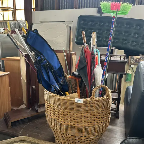 basket with umbrellas, chair, mop etc
