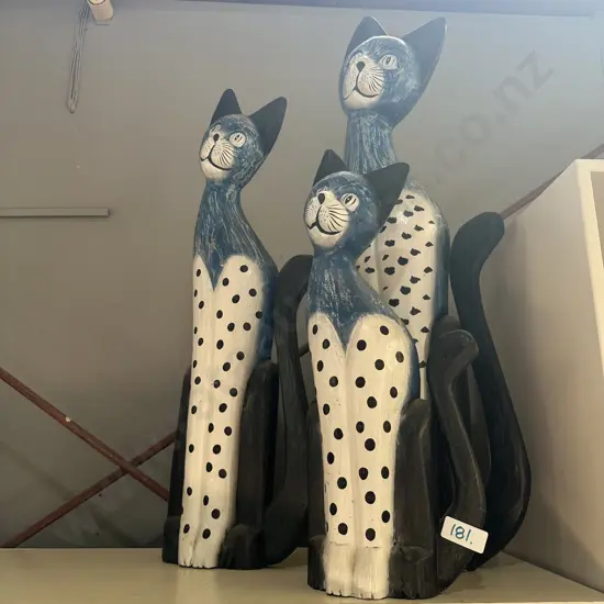 3 wooden cats