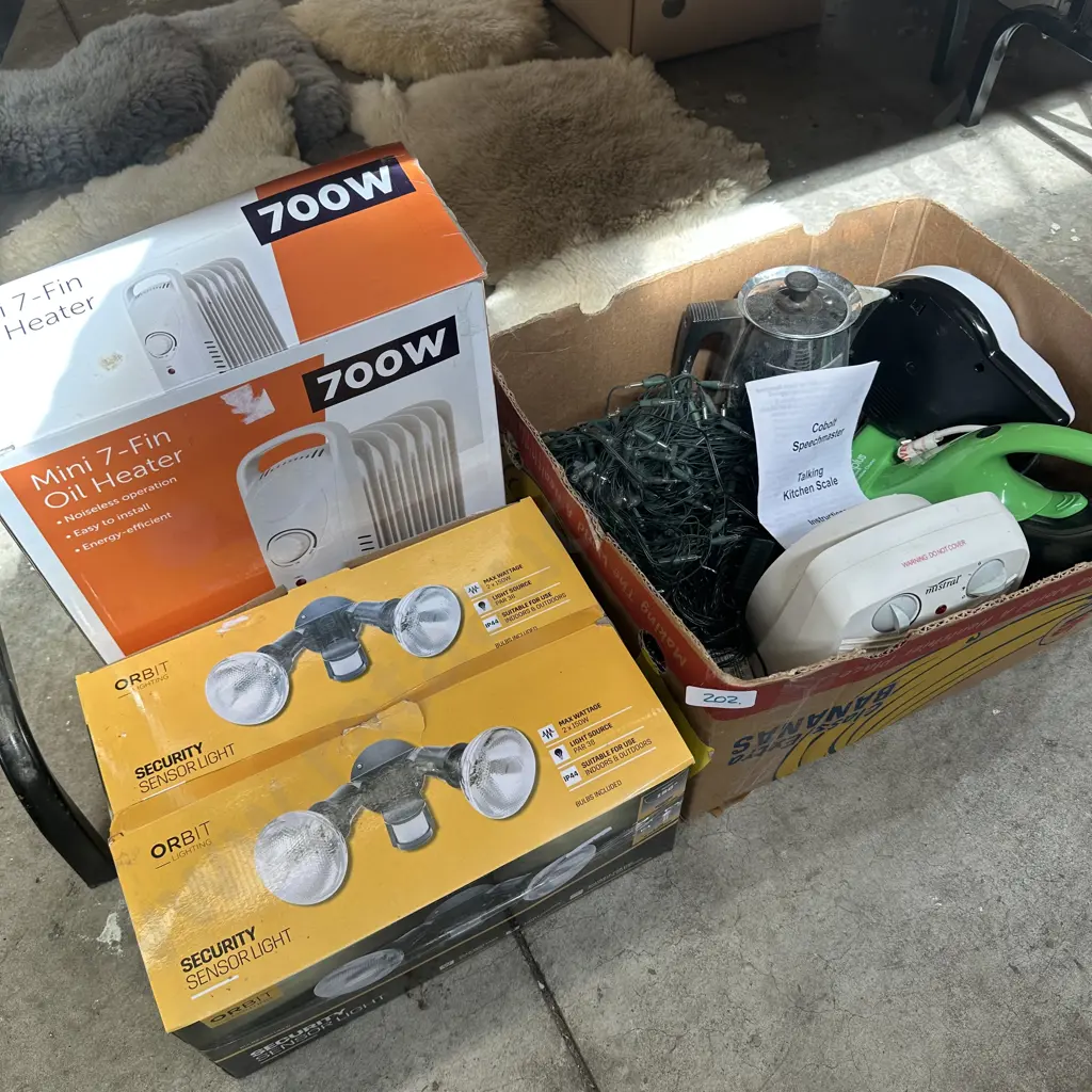 Boxed heater, security lights, talking scales and xmas lights etc. Image 1++