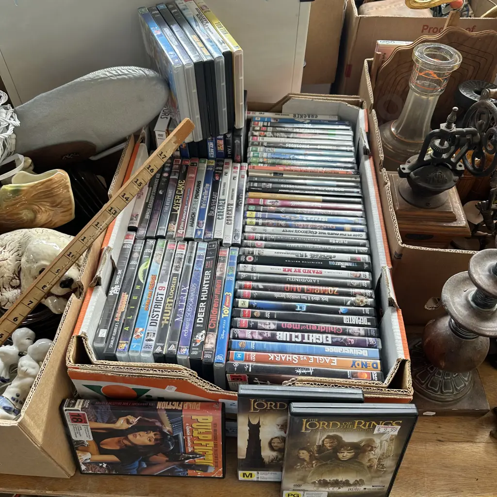 Large box of DVD movies. Image 1++