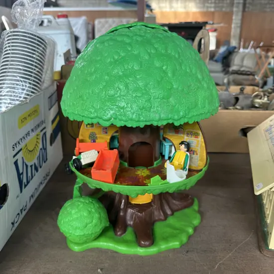 Vintage Tree house toy with elevator. Also storage bin.