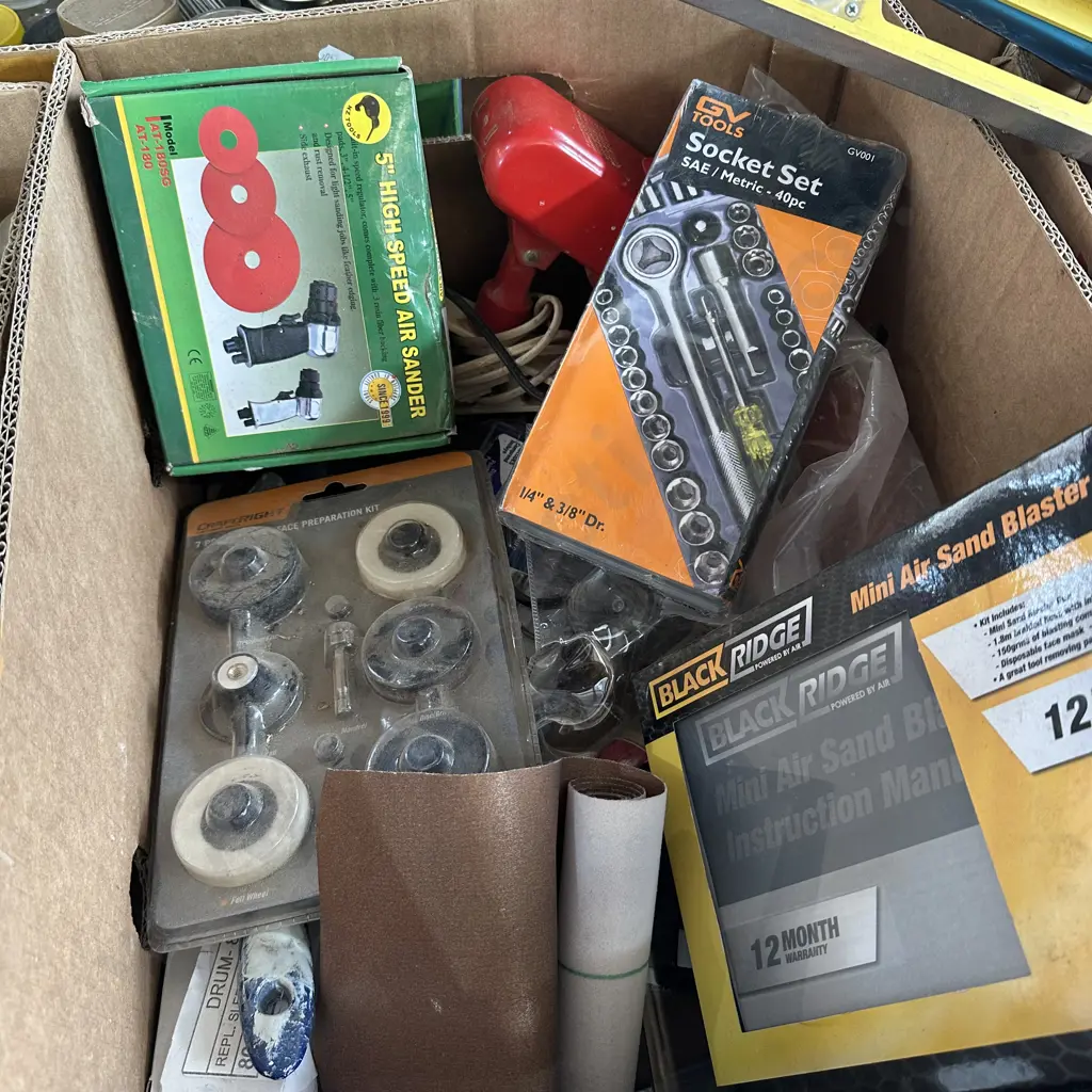 Box of tools including Air sander, Air sand blaster kit and socket set etc. Image 1++