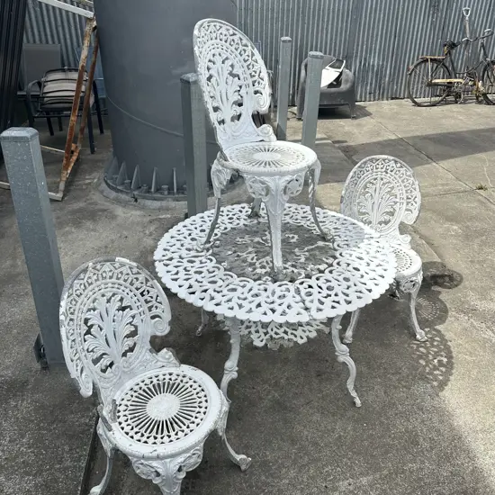 Courtyard table and three chairs set.