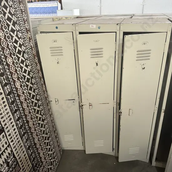 3 adjoined steel lockers (1 end open)