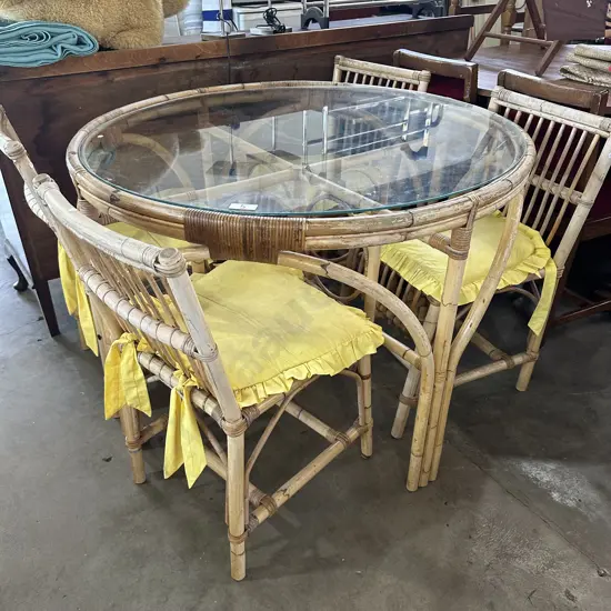 Cane & glass breakfast table and 4 chairs (average)