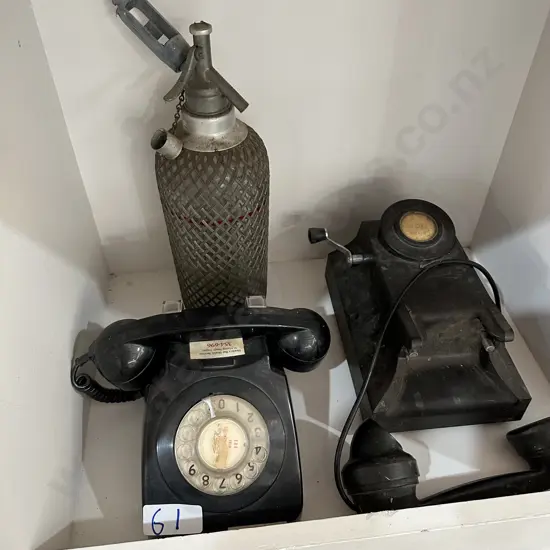 soda bottle and 2 phones