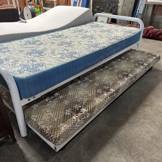Pr single beds plus roll away bed (2 photos)