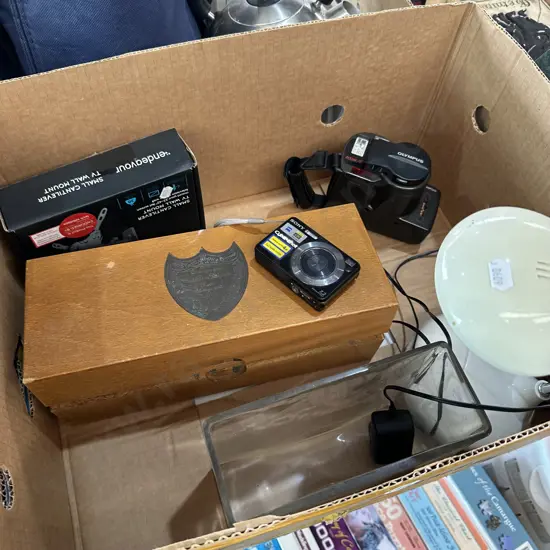 2 cameras, TV mount, vase, lamp, Moet box