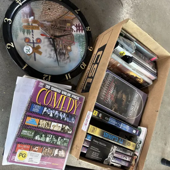 DVDs and CDs plus clock