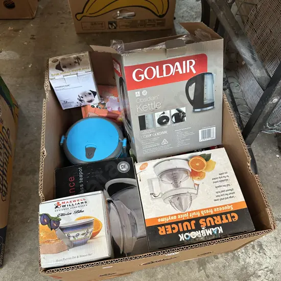 Boxes items including new kettle.