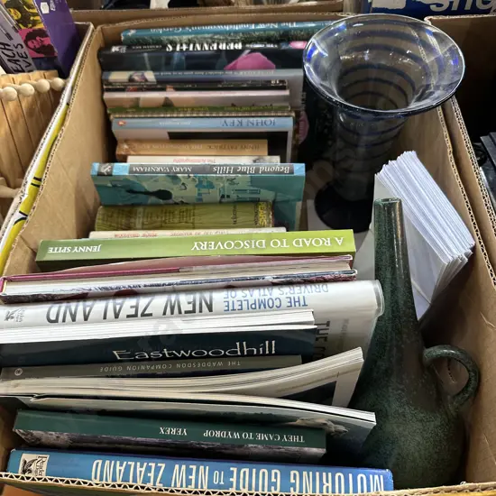 Box of books, envelopes, vases.