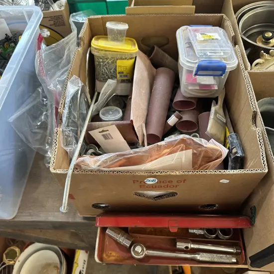 Box of hardware, sandpaper and tools.