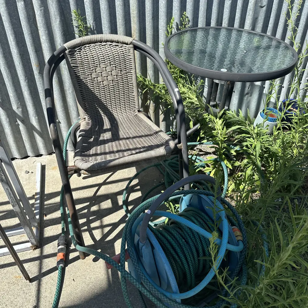 average patio table and chairs plus hose and reel Image 1++