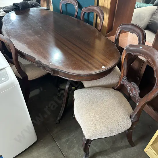 solid dining table and 6 chairs