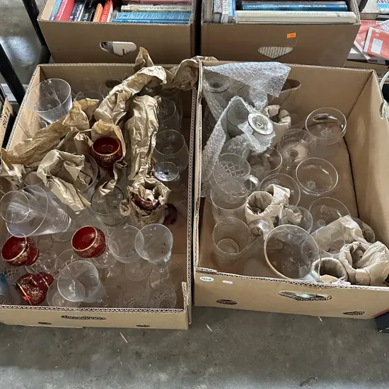 Two boxes of glassware and crystal.