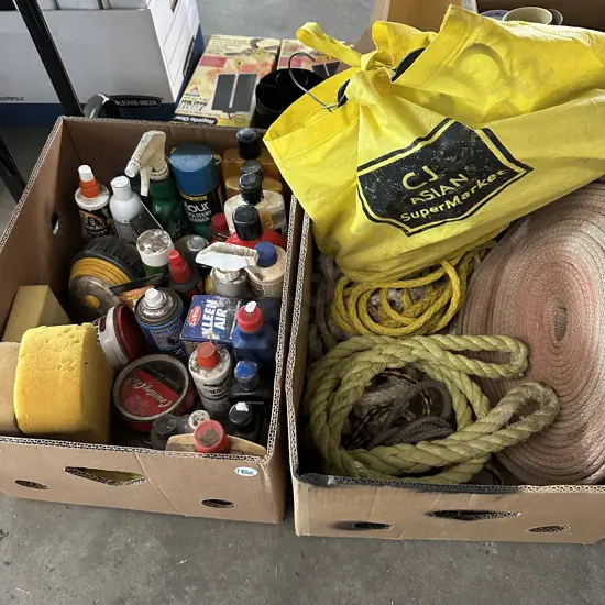 Two boxes including tow ropes, oils and car care products etc.