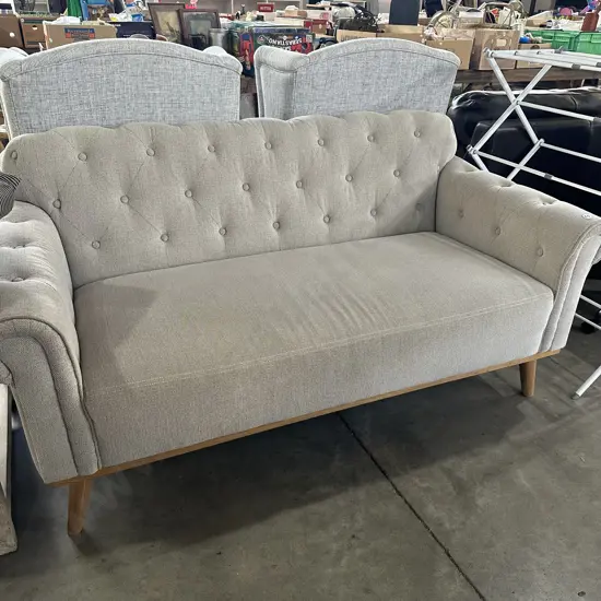 very tidy  modern rolled arm button back sofa
