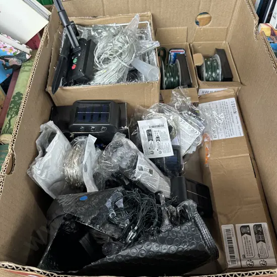 Box full of new solar lights.
