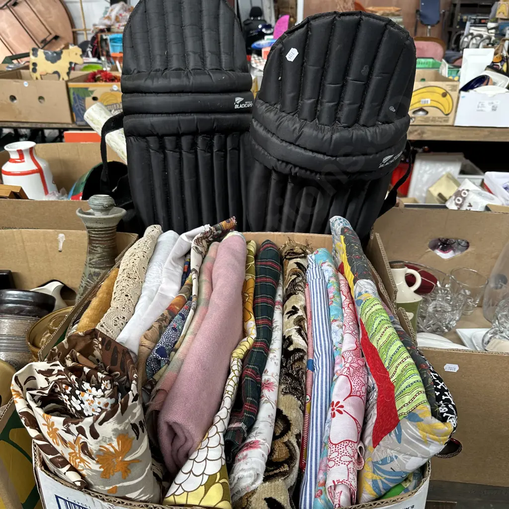 Box of vintage material plus black caps branded cricket pads. Image 1++