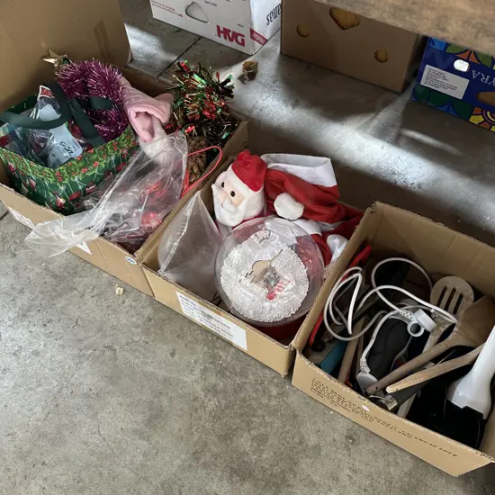 Three boxes of christmas decorations, kitchen utensils including stick blender etc.