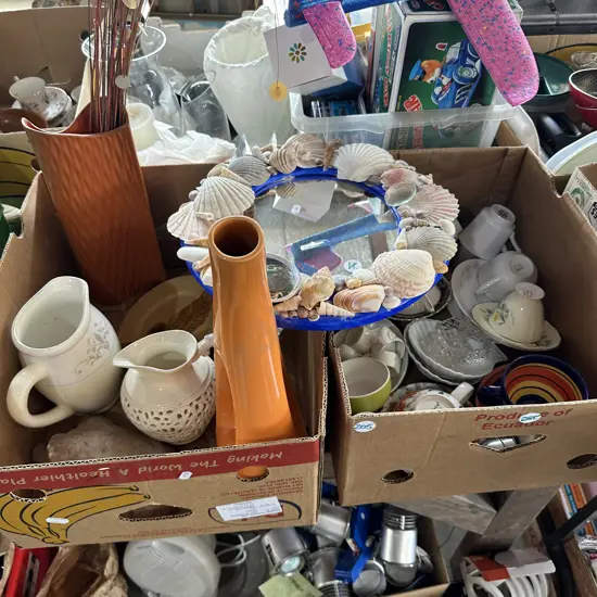 Two boxes of china and vases etc plus shell mirror.
